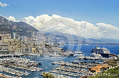 Monaco, France â€“ July 24, 2017: Picturesque view of famous marina with huge tourist liner in luxury Monaco. Editorial Stock Photo